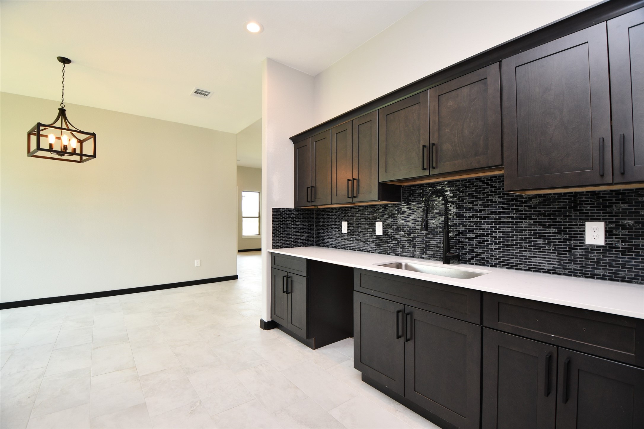 208 Silverleaf Road Sweeny, TX 77480 - Photo 20 of 49 a kitchen with stainless steel appliances granite countertop a sink a refrigerator and a stove