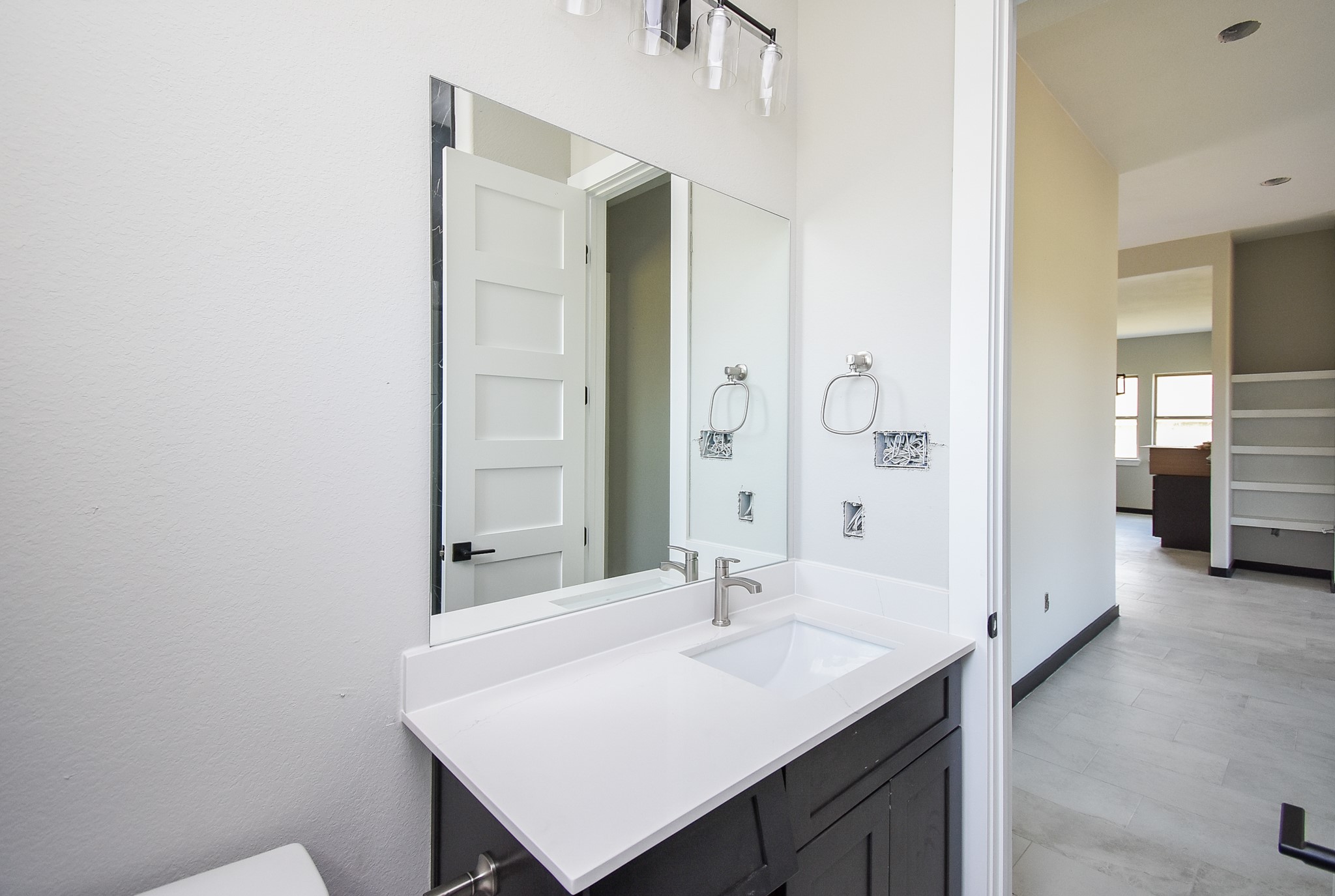 208 Silverleaf Road Sweeny, TX 77480 - Photo 40 of 49 a bathroom with a sink and a mirror