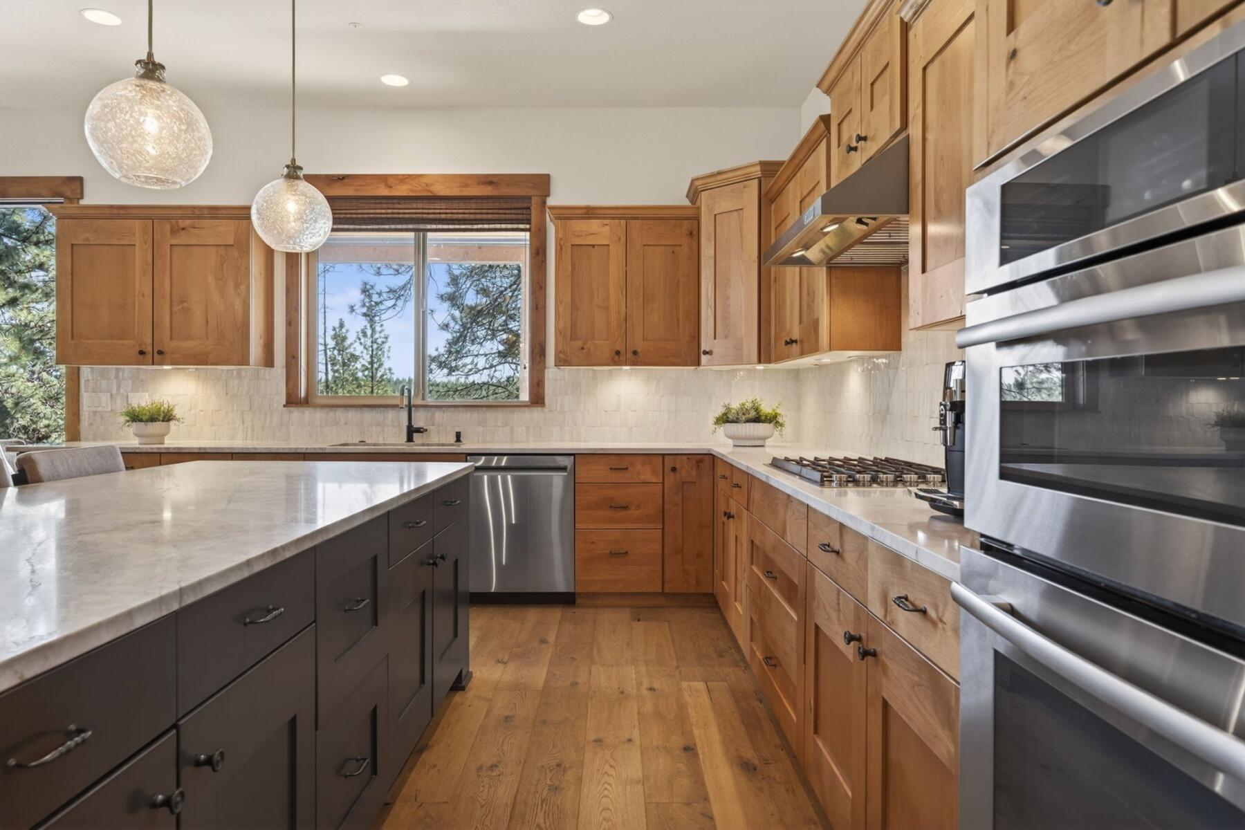 60420 Snap Shot Loop Bend, OR 97702 - Photo 9 of 51 Arteriors Monica Pendants over island
