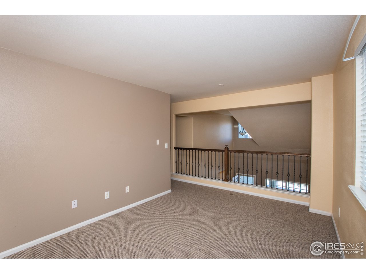10110 13th Street Road Greeley, CO 80634 - Photo 31 of 36 Loft area Family room