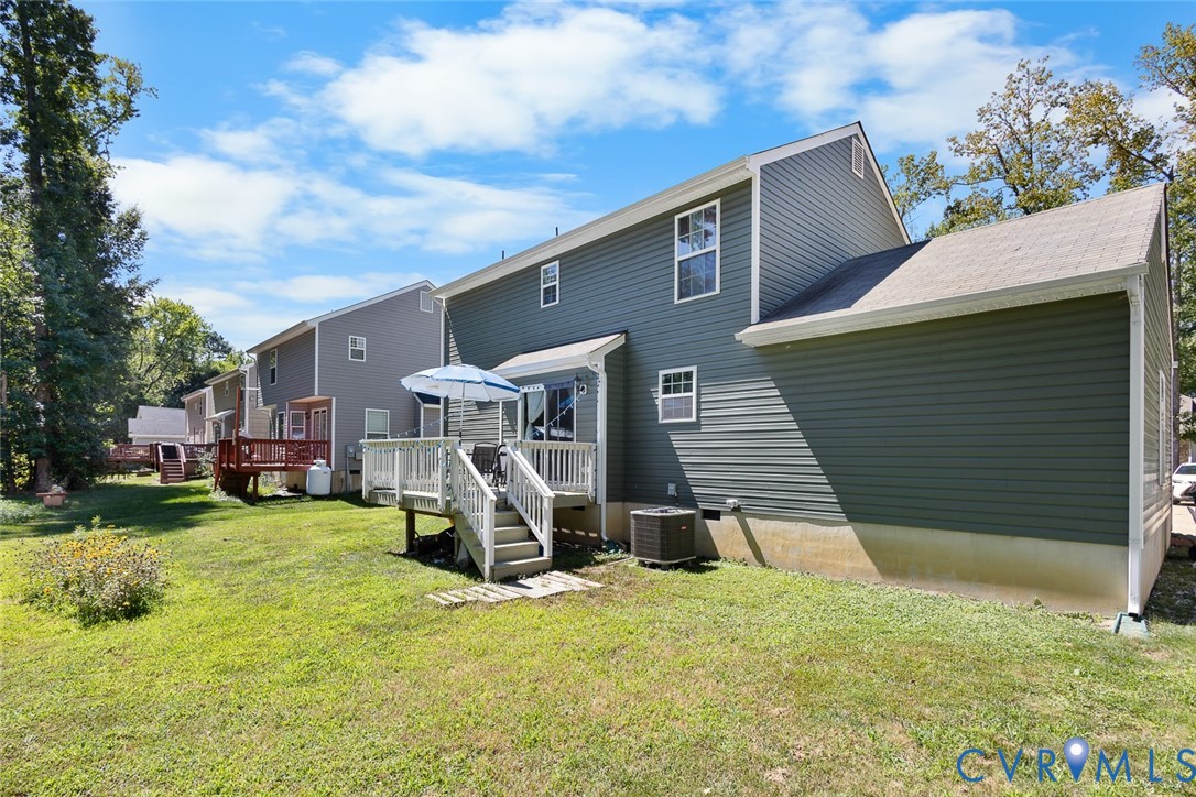 10155 Virginia Road Glen Allen, VA 23060 - Photo 24 of 34 Rear view of property with a lawn, a wooden deck,