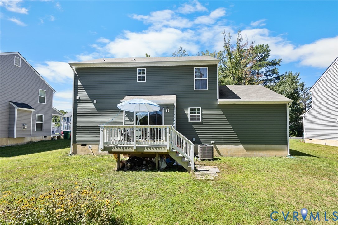 10155 Virginia Road Glen Allen, VA 23060 - Photo 25 of 34 Back of house with a deck and a lawn