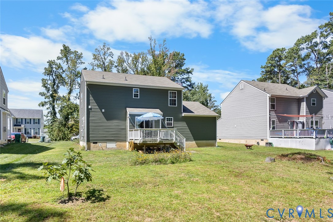 10155 Virginia Road Glen Allen, VA 23060 - Photo 26 of 34 Back of house featuring a deck, a yard, and crawl