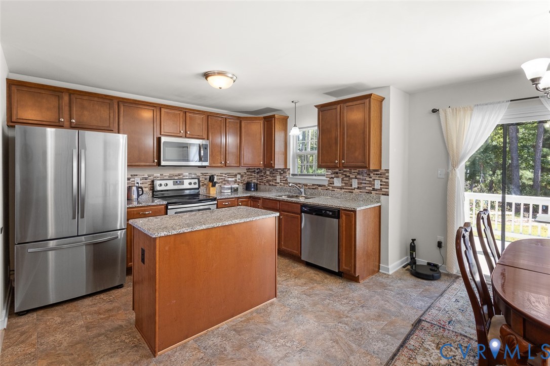 10155 Virginia Road Glen Allen, VA 23060 - Photo 8 of 34 Kitchen featuring stainless steel appliances, deco