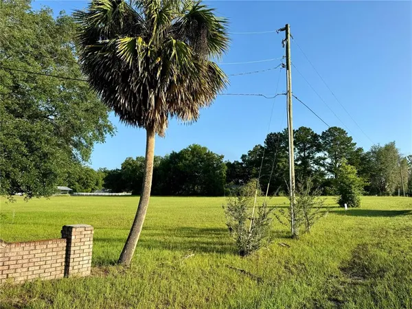 a view of a park with swings