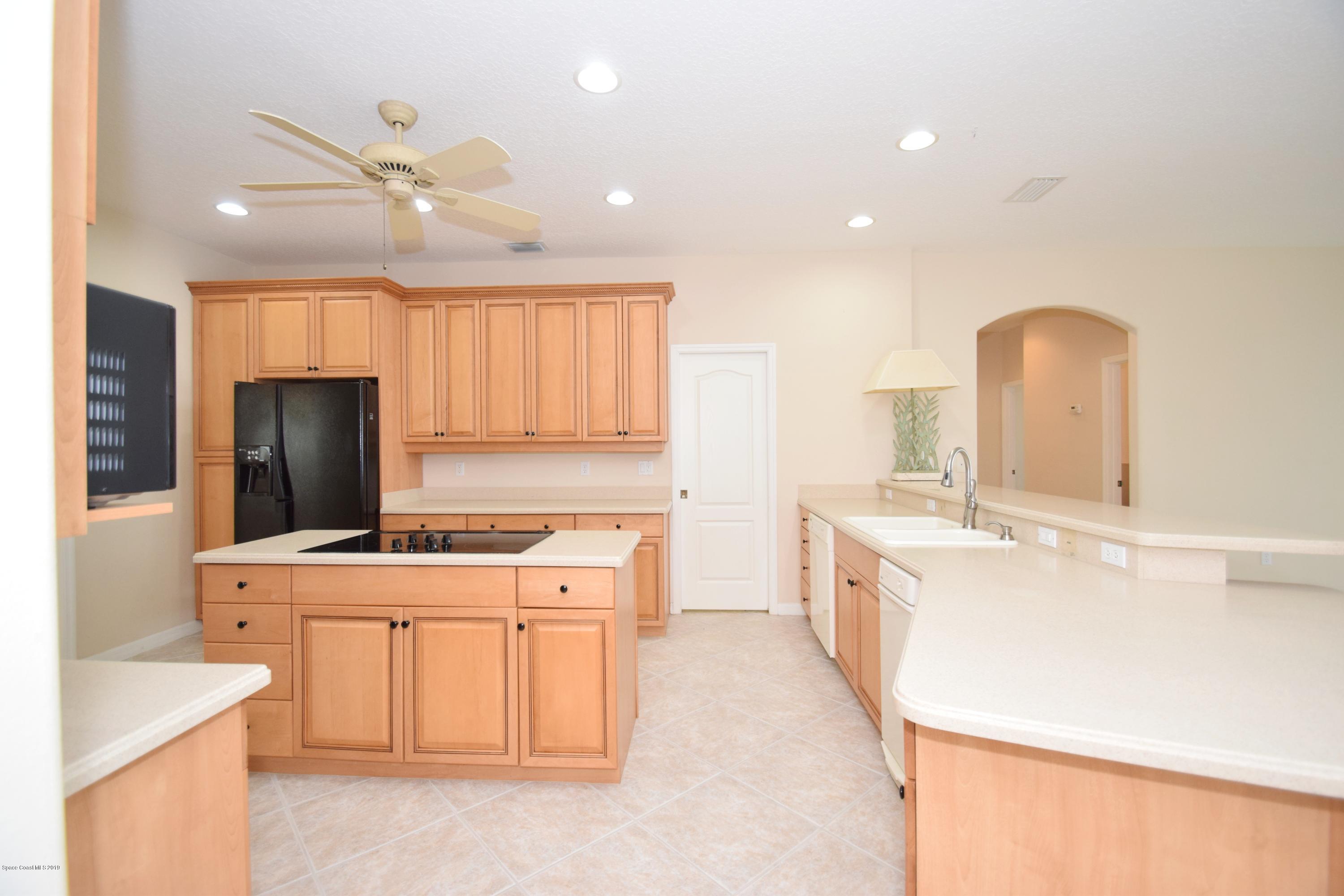 1745 Vía Roma Merritt Island, FL 32952 - Photo 11 of 32 Kitchen View 2