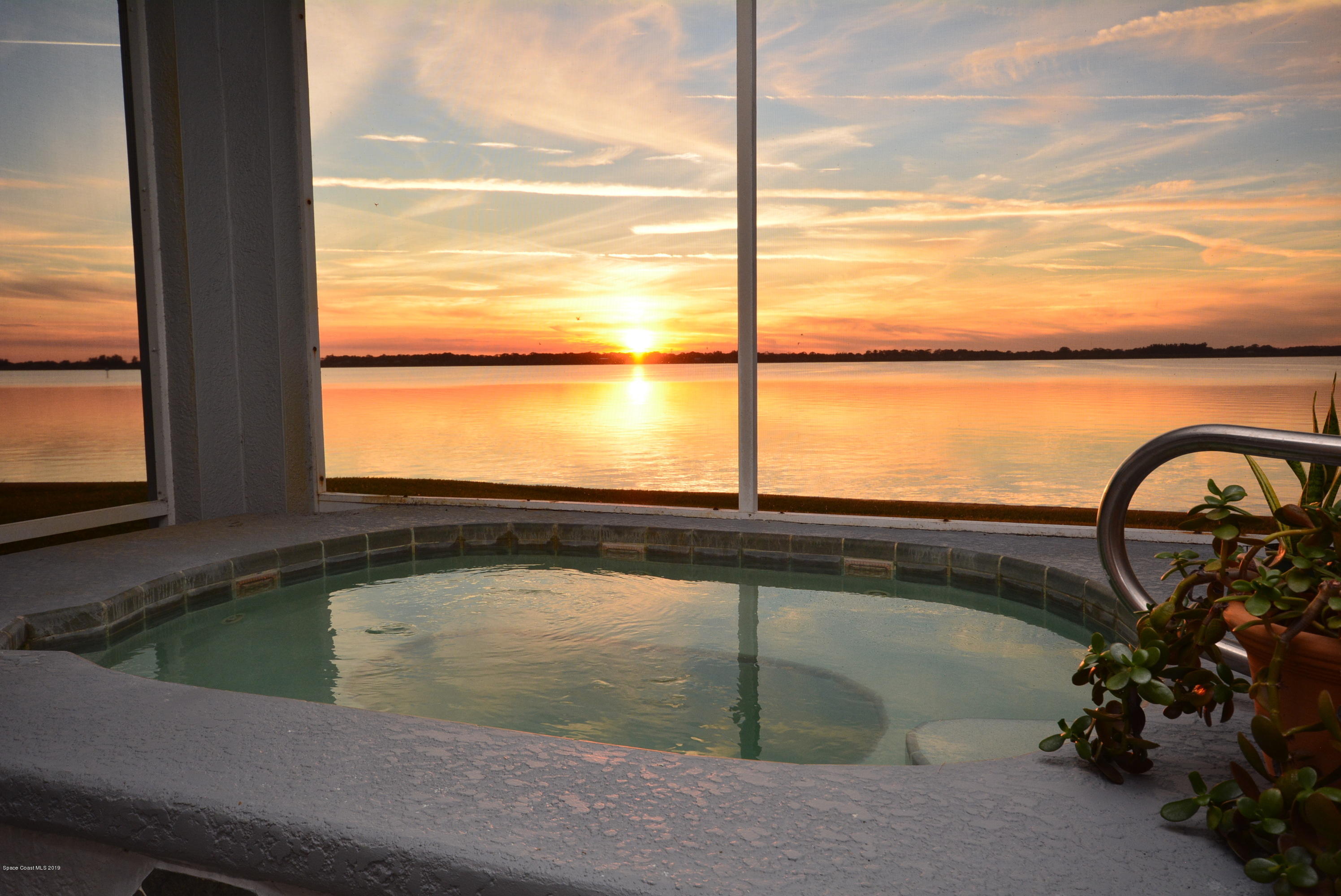 1745 Vía Roma Merritt Island, FL 32952 - Photo 16 of 32 Hot Tub Sunset!