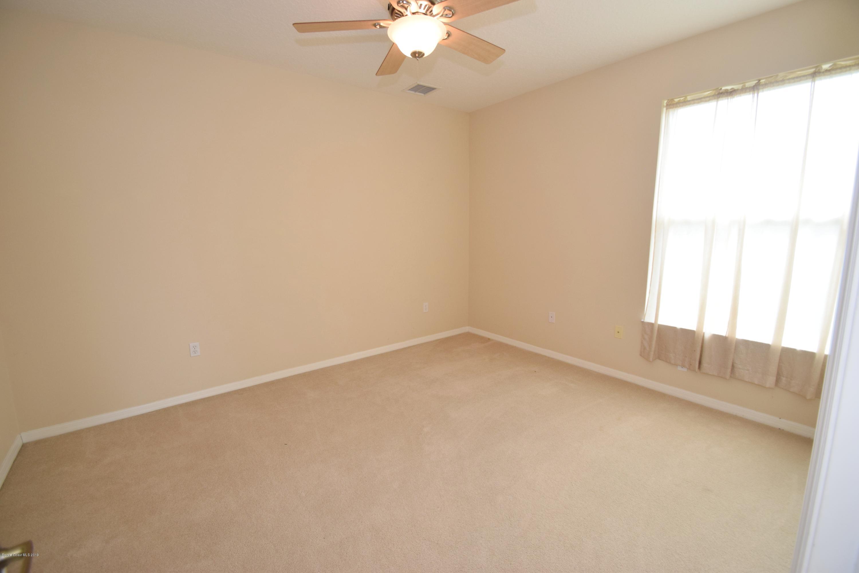 1745 Vía Roma Merritt Island, FL 32952 - Photo 24 of 32 Bedroom 2