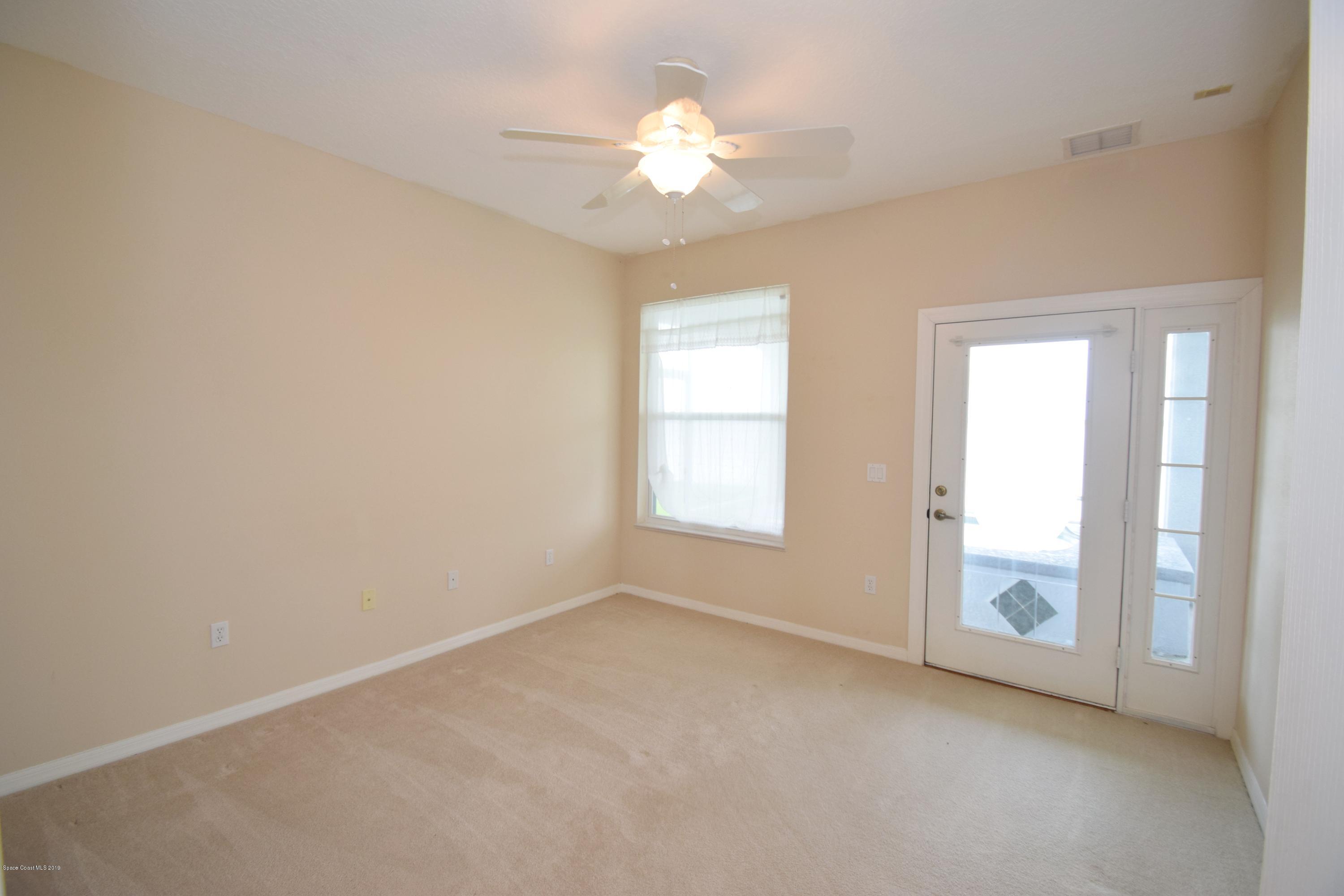 1745 Vía Roma Merritt Island, FL 32952 - Photo 25 of 32 Bedroom 3