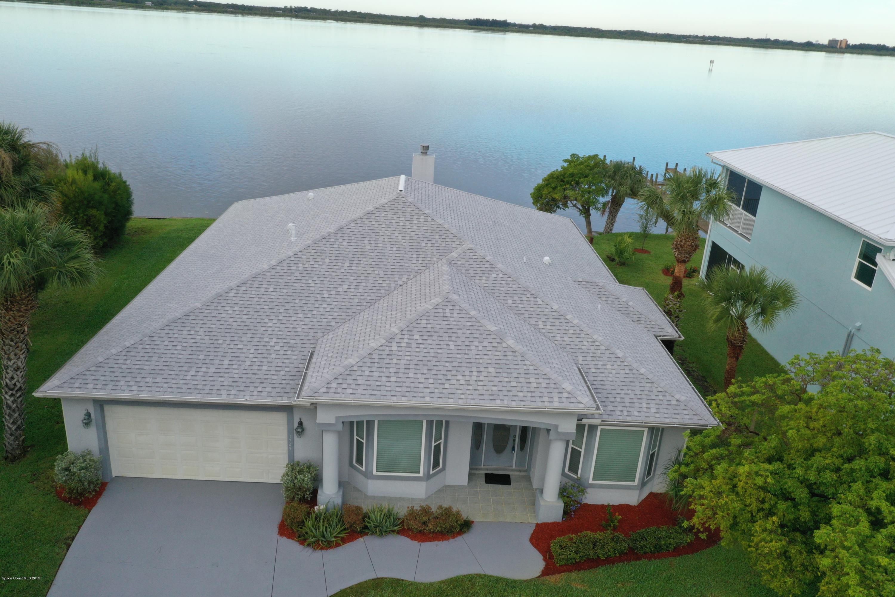 1745 Vía Roma Merritt Island, FL 32952 - Photo 4 of 32 Aerial View