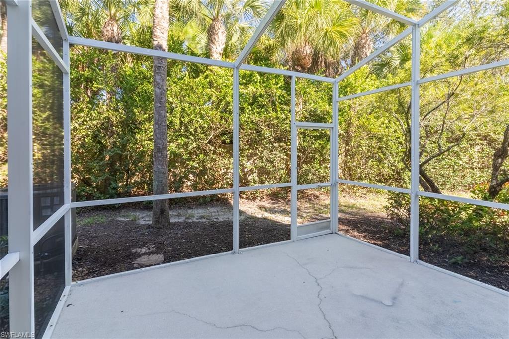 16146 Caldera Lane, Unit 31 Naples, FL 34110 - Photo 12 of 35 a view of outdoor space and deck