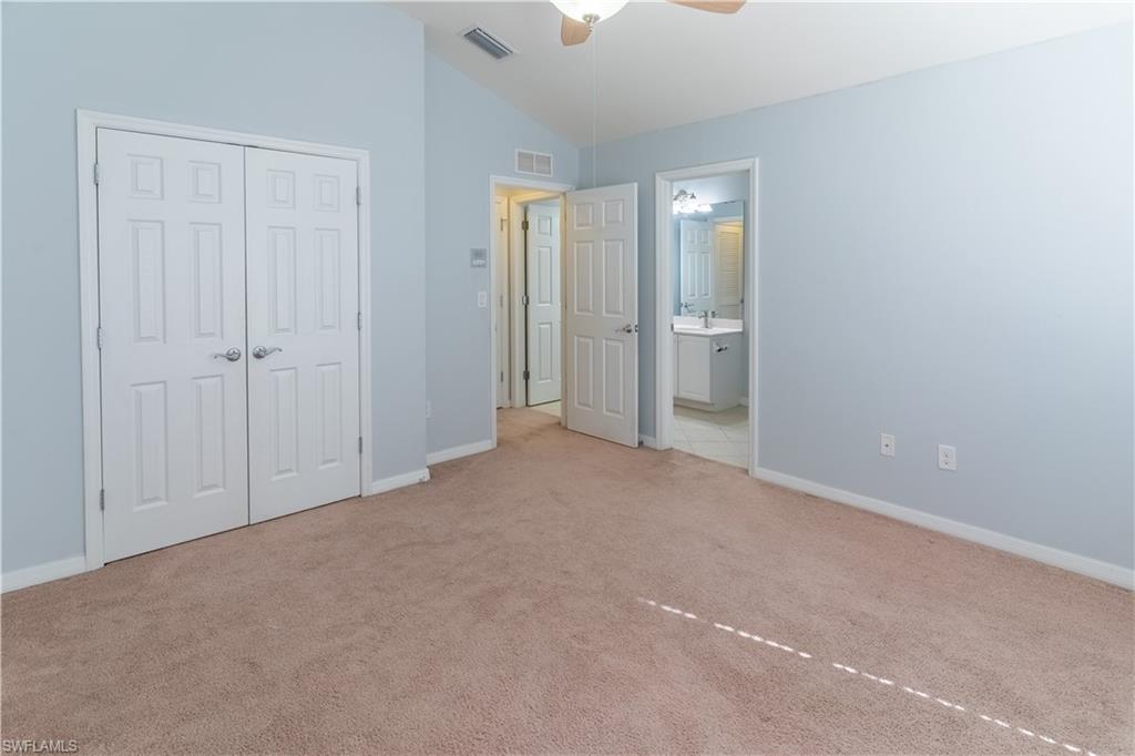 16146 Caldera Lane, Unit 31 Naples, FL 34110 - Photo 15 of 35 a view of an empty room with a bathroom