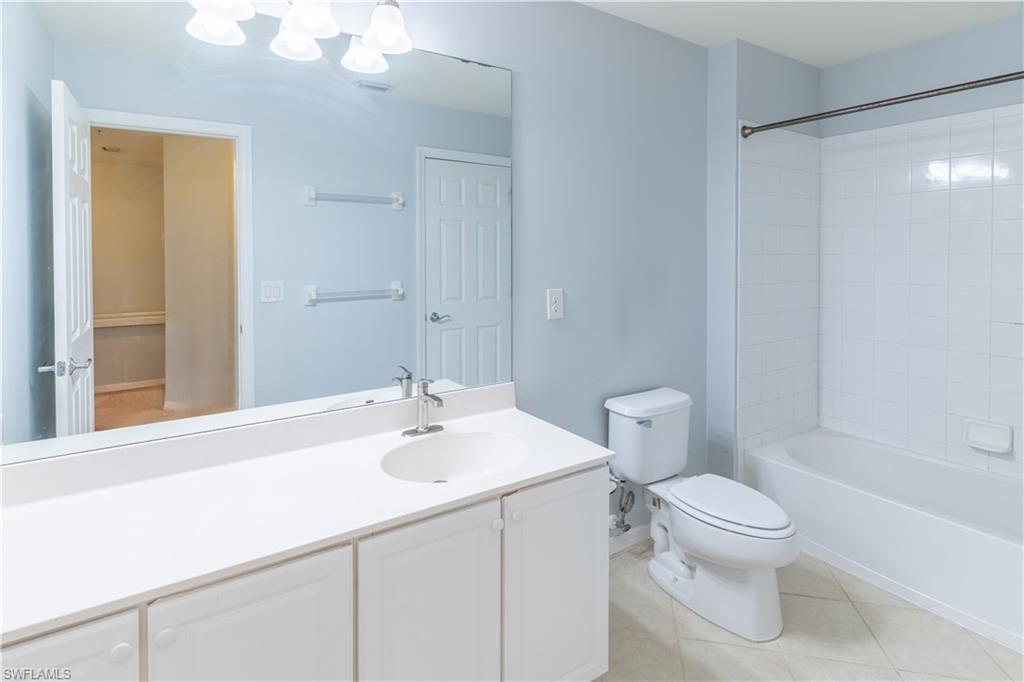16146 Caldera Lane, Unit 31 Naples, FL 34110 - Photo 16 of 35 a bathroom with a sink toilet and shower