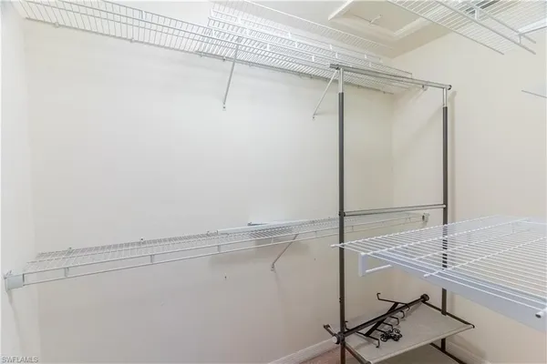 a view of a livingroom with furniture and a fireplace