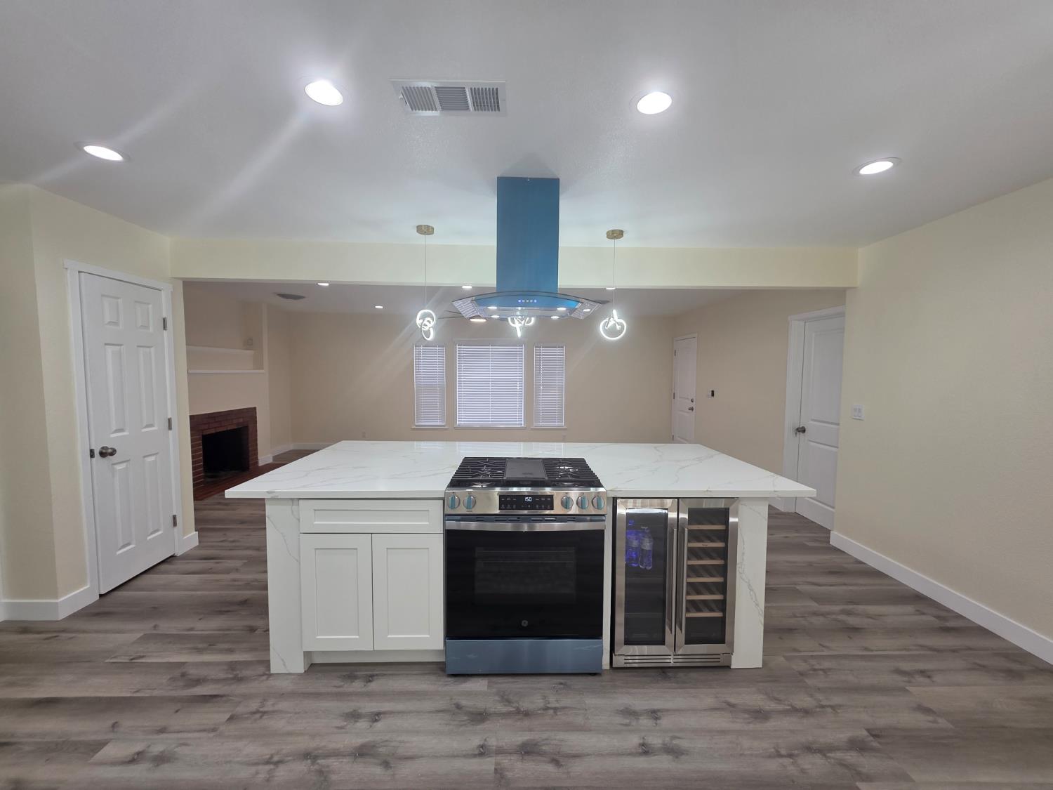1098 East 21st Street Merced, CA 95340 - Photo 9 of 23 a kitchen with a stove and a sink