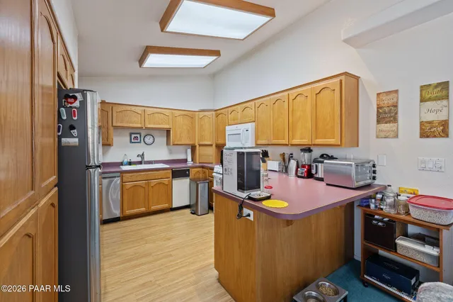 a kitchen with a stove and a sink