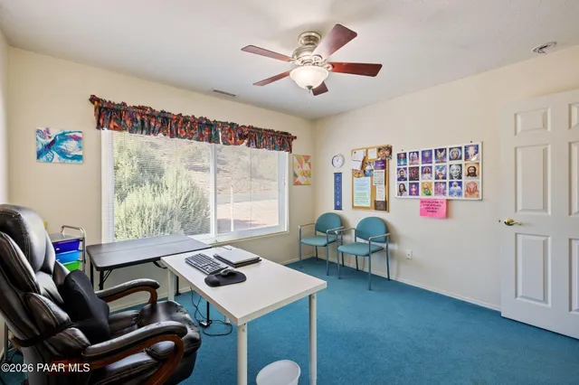a bathroom with a sink vanity and mirror