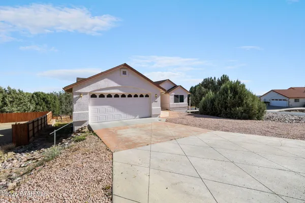 a spacious bathroom with a sink and a mirror