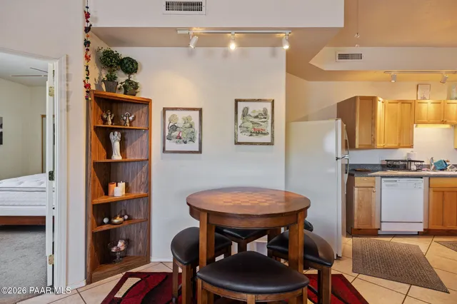 a bedroom with a bed and dresser