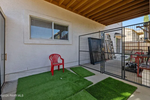 an aerial view of residential house with outdoor space and parking