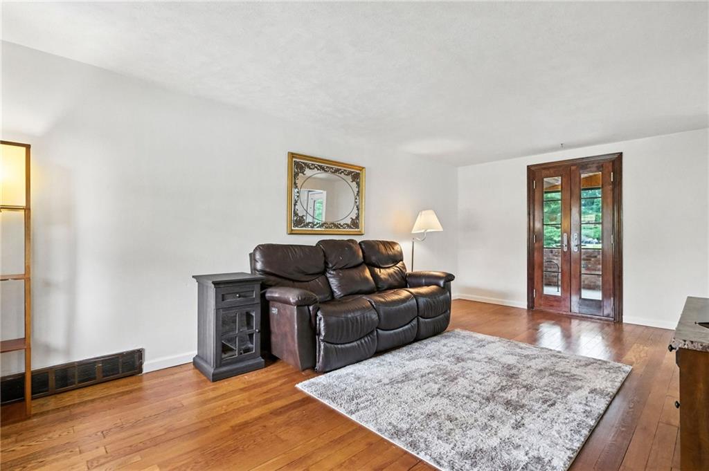 616 Highview Road Pittsburgh, PA 15234 - Photo 6 of 35 a living room with furniture and wooden floor