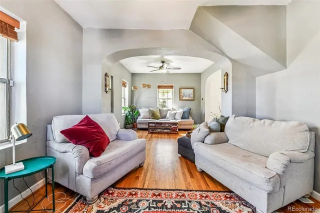 a living room with furniture and a couch
