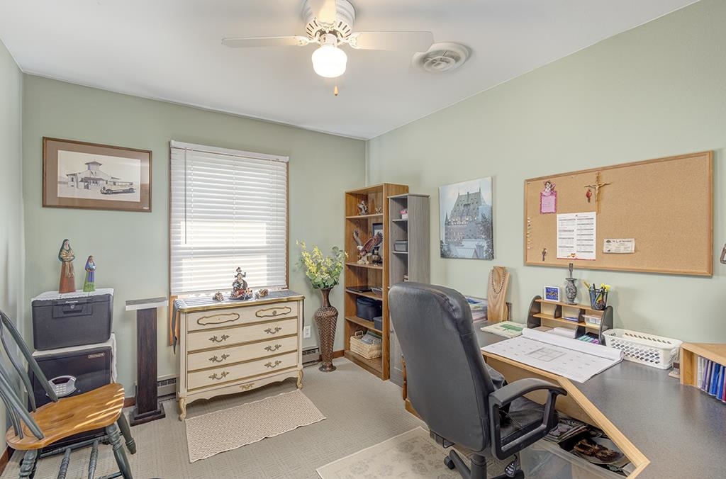 886 Breckenboro Road Davis, IL 61019 - Photo 26 of 37 a view of a workspace with furniture and a window