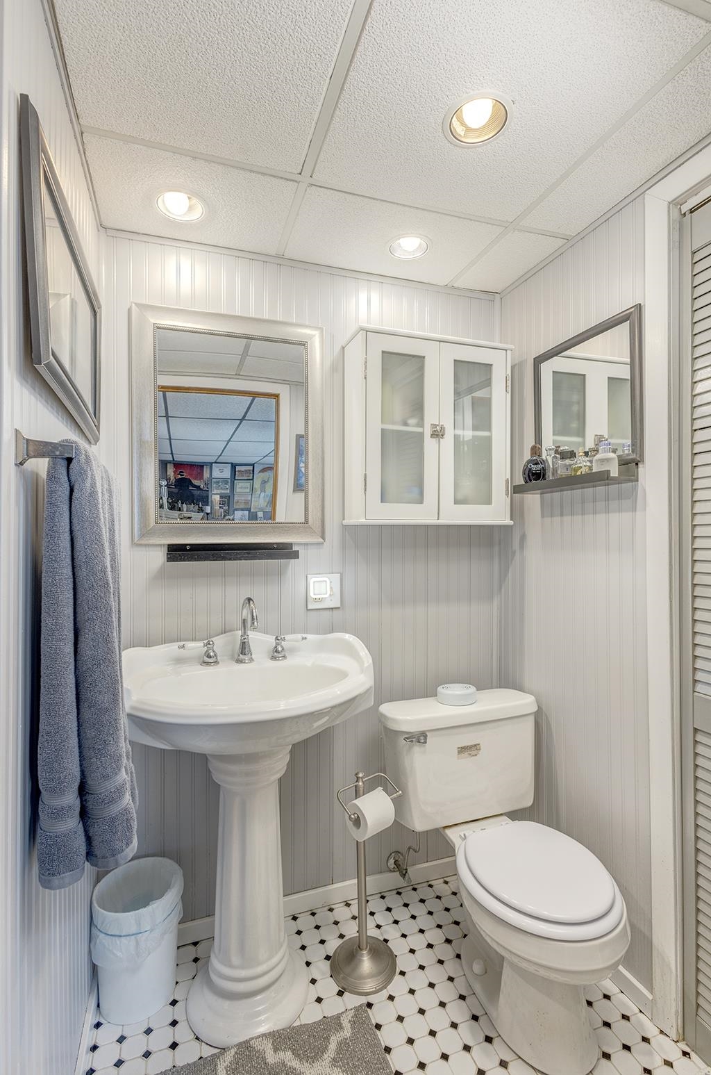886 Breckenboro Road Davis, IL 61019 - Photo 31 of 37 a bathroom with a toilet sink and mirror