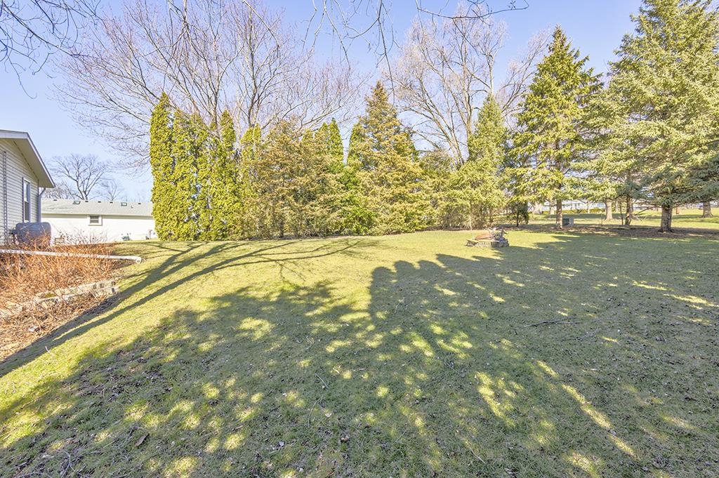 886 Breckenboro Road Davis, IL 61019 - Photo 36 of 37 a view of yard with swimming pool
