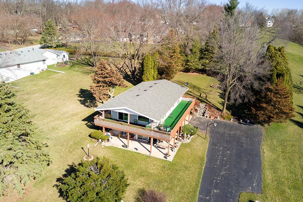 886 Breckenboro Road Davis, IL 61019 - Photo 5 of 37 a aerial view of a house with a lake view