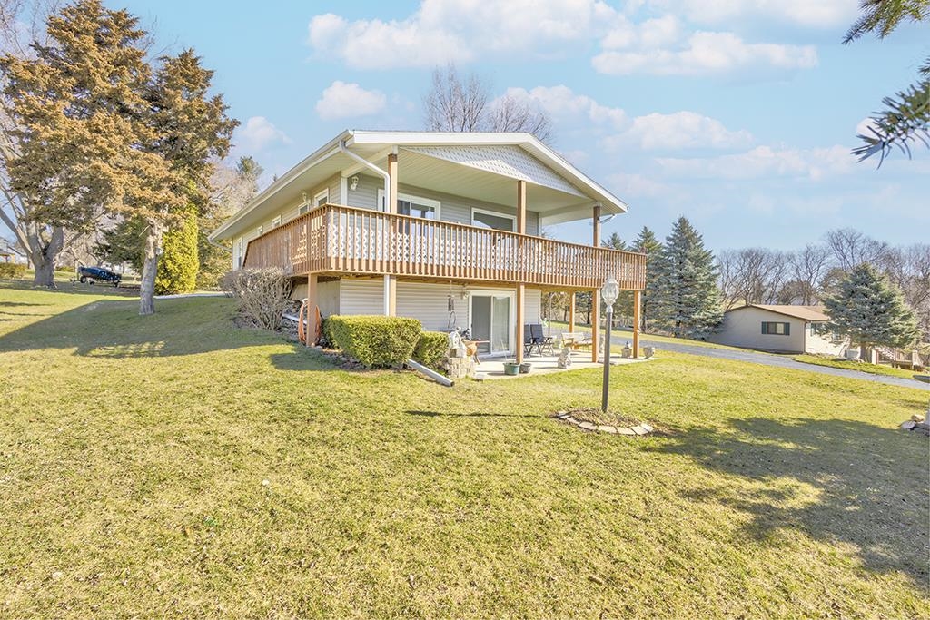 886 Breckenboro Road Davis, IL 61019 - Photo 7 of 37 a view of a house with a yard