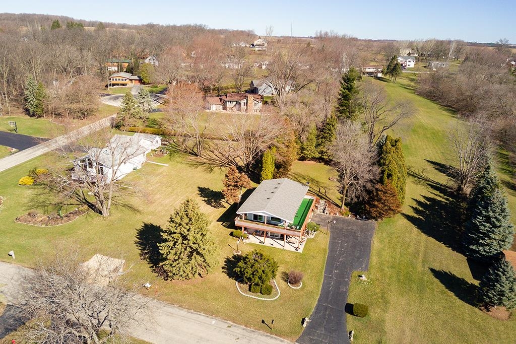 886 Breckenboro Road Davis, IL 61019 - Photo 10 of 37 an aerial view of residential houses with outdoor space