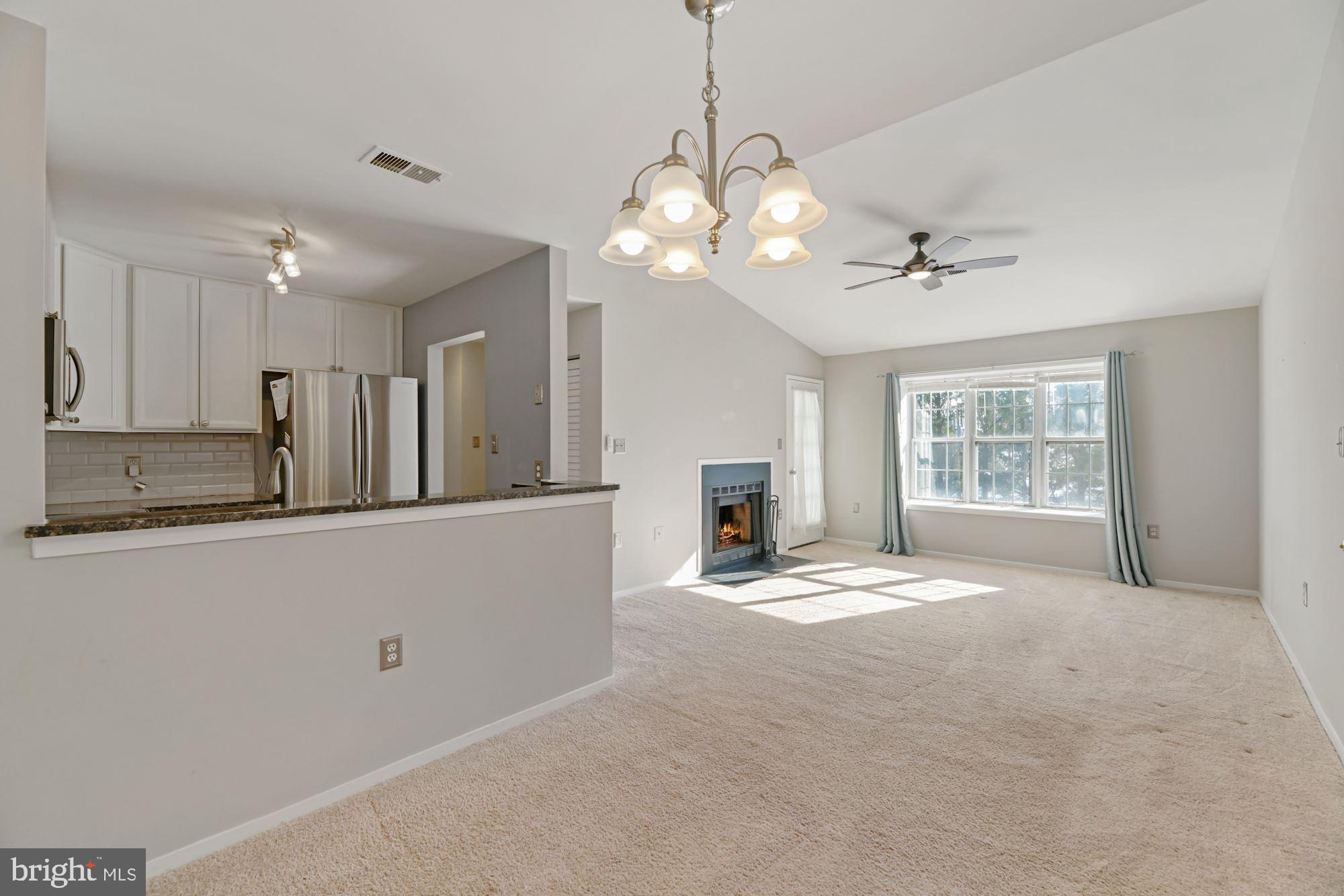7817 D Harrowgate Circle, Unit 156 Springfield, VA 22152 - Photo 12 of 26 Kitchen and LR from DR