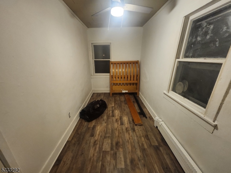 20 Adams Street Belvidere, NJ 07823 - Photo 7 of 11 a view of a livingroom with wooden floor and stairs