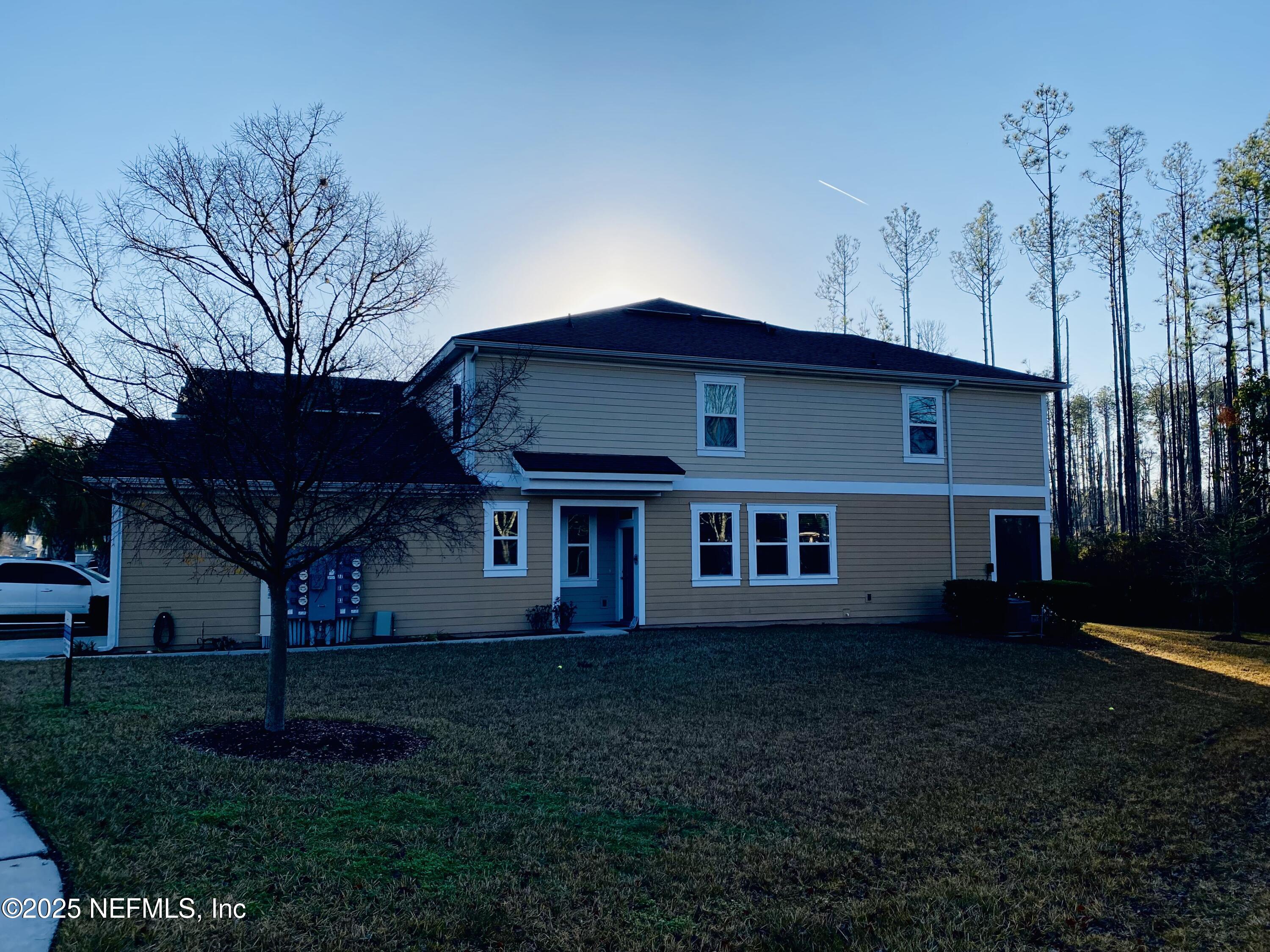 99 Bush Place St. Johns, FL 32259 - Photo 11 of 21 a view of a house with backyard and garden