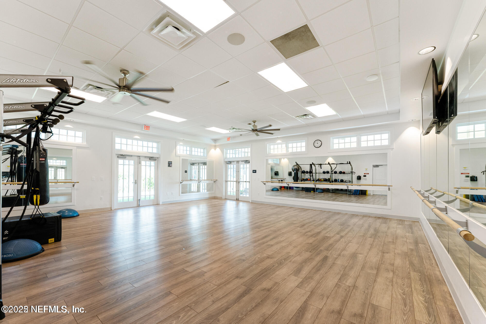 99 Bush Place St. Johns, FL 32259 - Photo 15 of 21 a view of a living room a chandelier fan and view of a kitchen