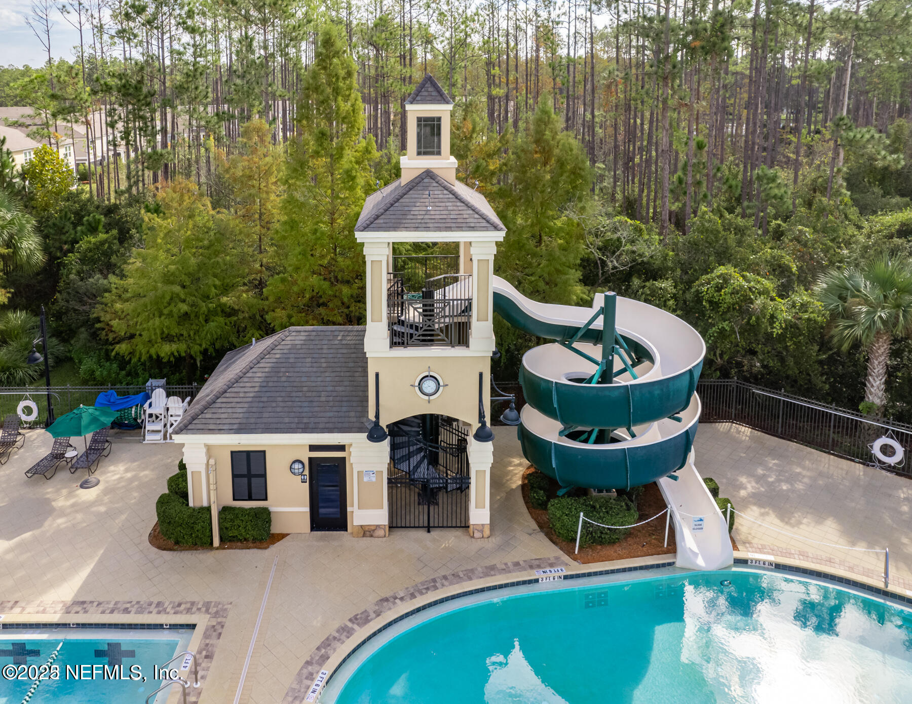 99 Bush Place St. Johns, FL 32259 - Photo 17 of 21 a front view of a house with garden