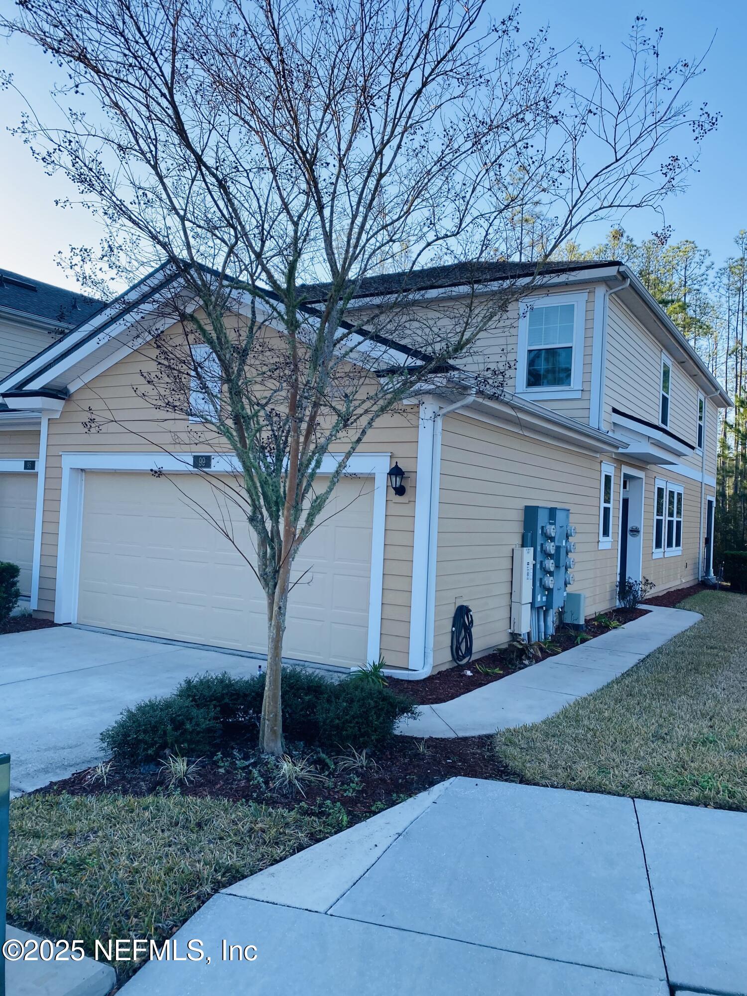 99 Bush Place St. Johns, FL 32259 - Photo 2 of 21 a view of a yard in front view of a house