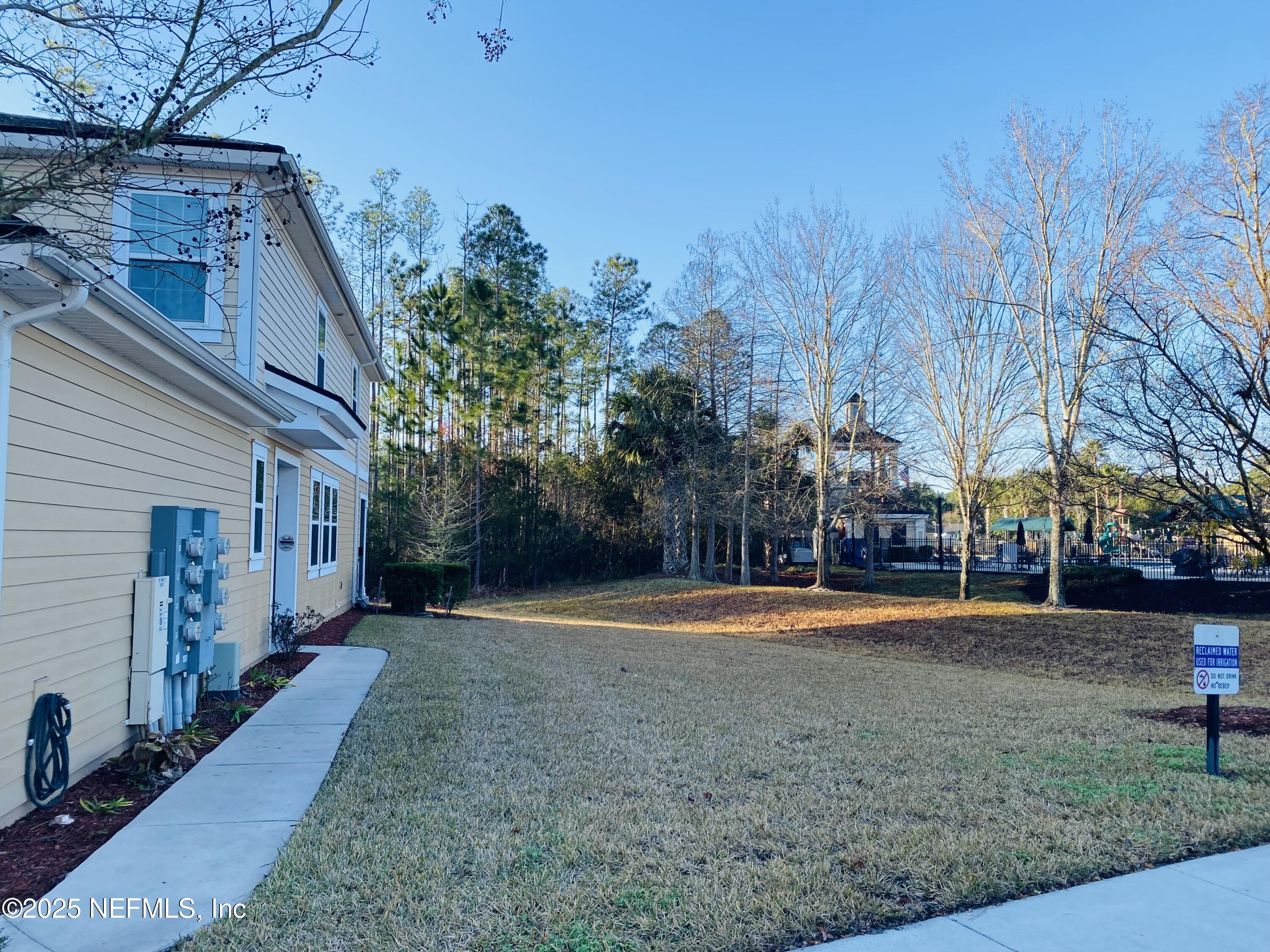 99 Bush Place St. Johns, FL 32259 - Photo 8 of 21 a view of a house with a yard