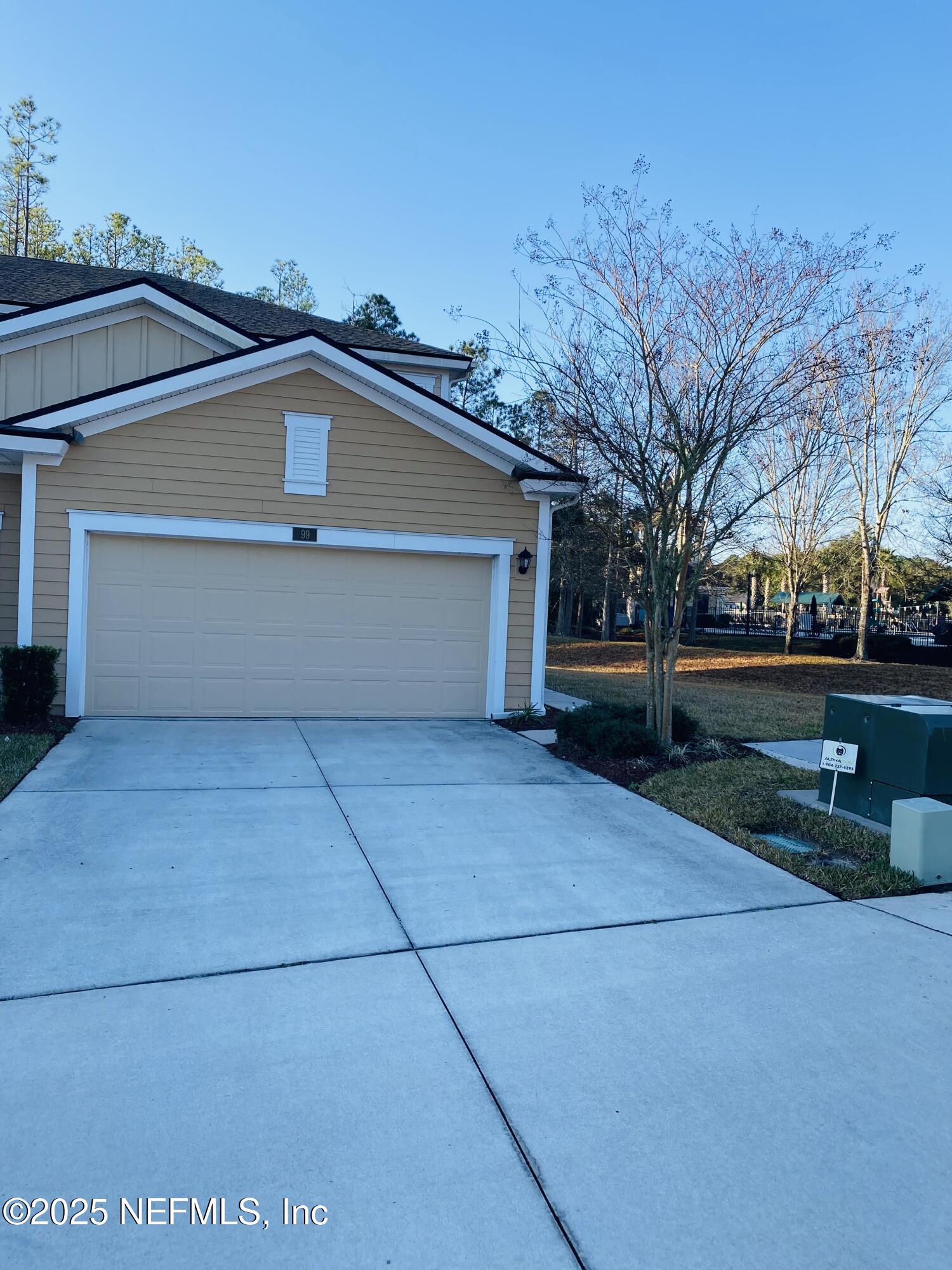 99 Bush Place St. Johns, FL 32259 - Photo 10 of 21 a front view of a house with a yard