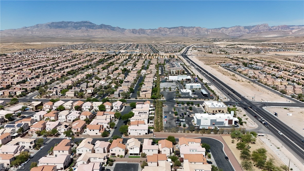 8934 Deep Ridge Court Las Vegas, NV 89178 - Photo 44 of 47 Expansive desert vistas surround a vibrant community with diverse housing and essential amenities.