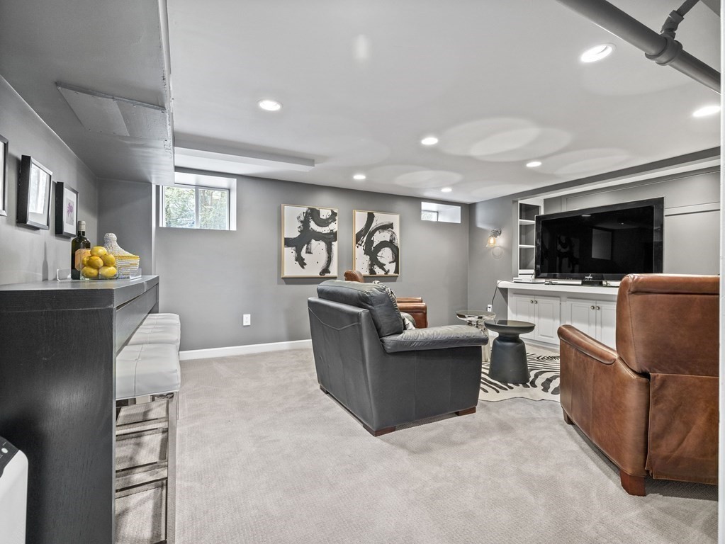 97 Crest Road Wellesley, MA 02482 - Photo 18 of 26 a living room with furniture and a flat screen tv