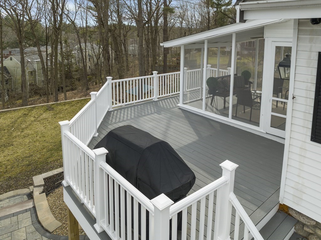 97 Crest Road Wellesley, MA 02482 - Photo 22 of 26 a balcony with wooden floor and fence