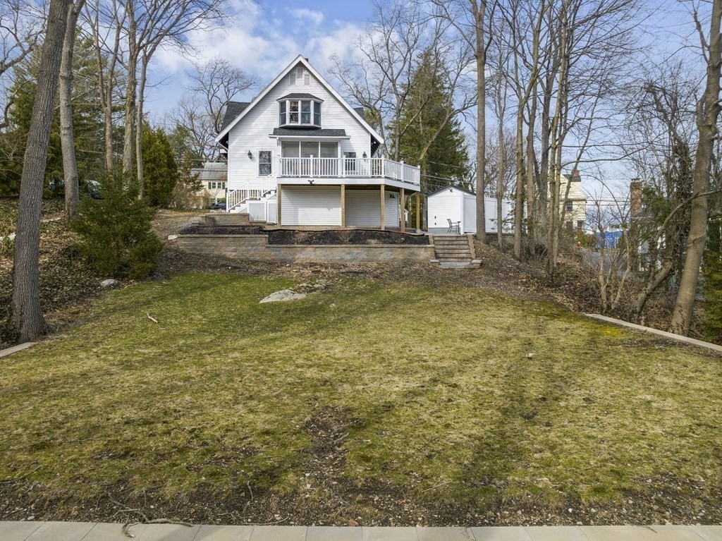 97 Crest Road Wellesley, MA 02482 - Photo 24 of 26 a front view of a house with a yard