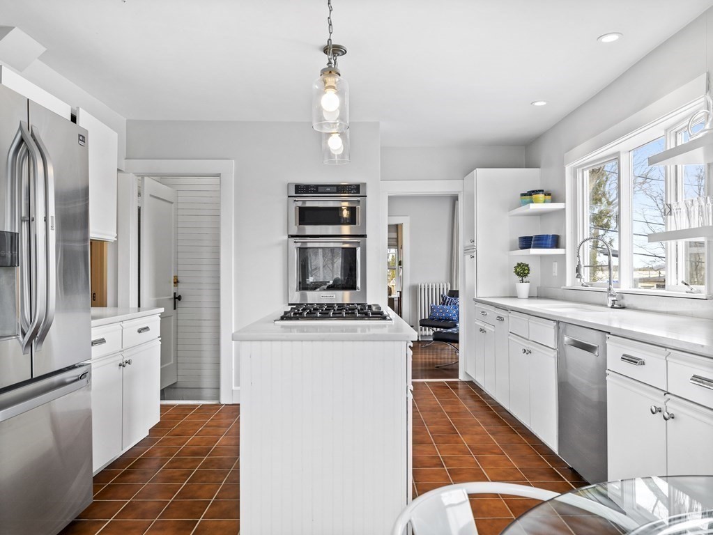 97 Crest Road Wellesley, MA 02482 - Photo 7 of 26 a kitchen with a stove a refrigerator and a sink