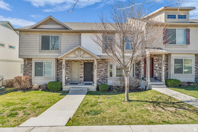 927 Independence Avenue Provo, UT 84604 - Photo 1 of 1 Traditional home featuring a front yard and stone siding