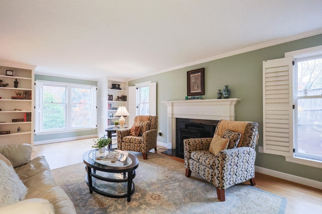 5 Old Wood Road North Attleboro, MA 02760 - Photo 11 of 41 a living room with furniture a fireplace and a large window