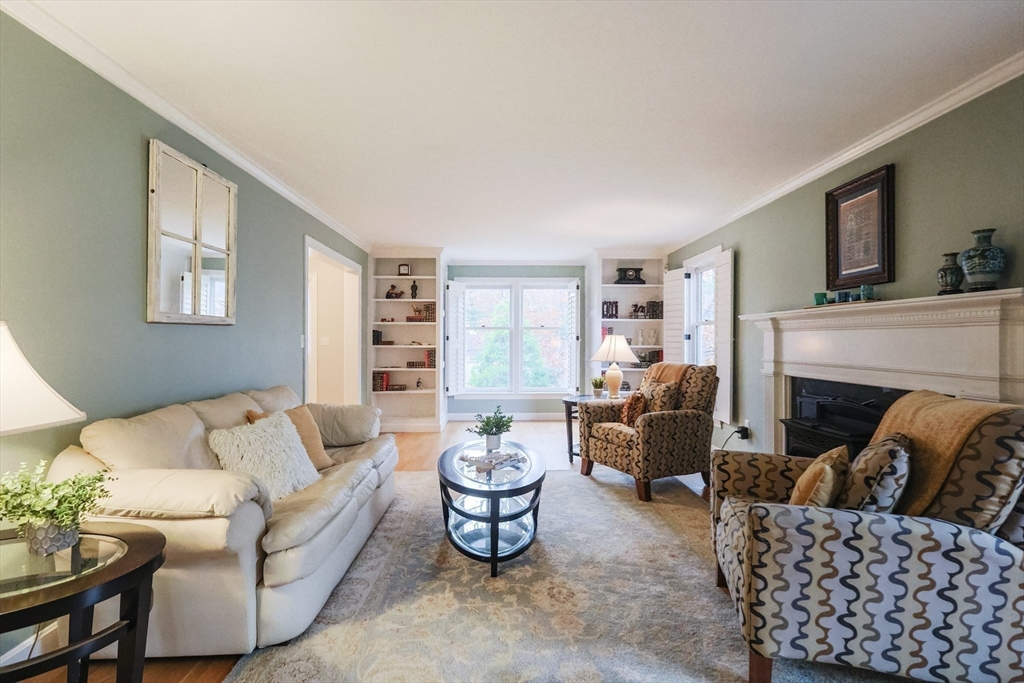 5 Old Wood Road North Attleboro, MA 02760 - Photo 13 of 41 a living room with furniture a fireplace and a large window