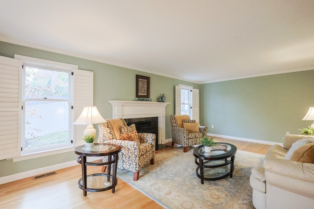 5 Old Wood Road North Attleboro, MA 02760 - Photo 14 of 41 a living room with furniture fireplace and a table