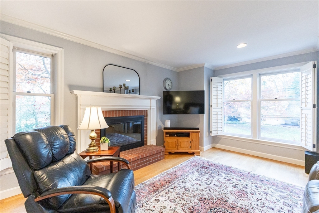 5 Old Wood Road North Attleboro, MA 02760 - Photo 16 of 41 a living room with furniture and a fireplace